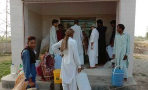 People Collecting Water