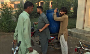 People Collecting Water